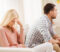 people, relationship difficulties, conflict and family concept - An unhappy woman and man engaging in conflict