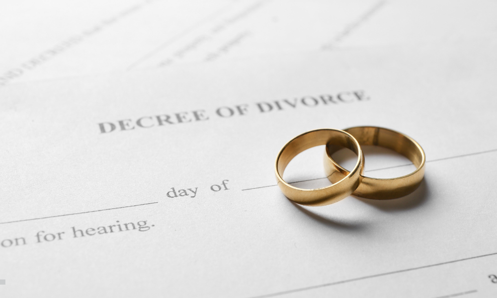Wedding rings on a decree of divorce document