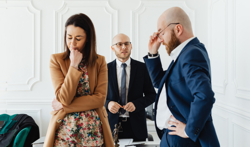 People engaging in a contentious divorce